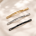 Xelqoriv™ 3-Piece Minimalist Matte Metal Bobby Pins – Non-Slip Wave Contoured Hair Styling Pins for Women &amp; Girls (Gold, Silver, Black)